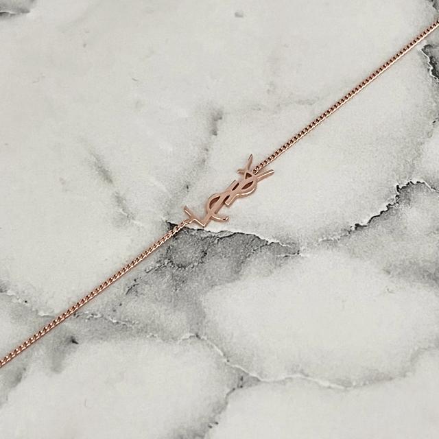 Saint Laurent Opium YSL Logo Charm Bracelet Rose Gold