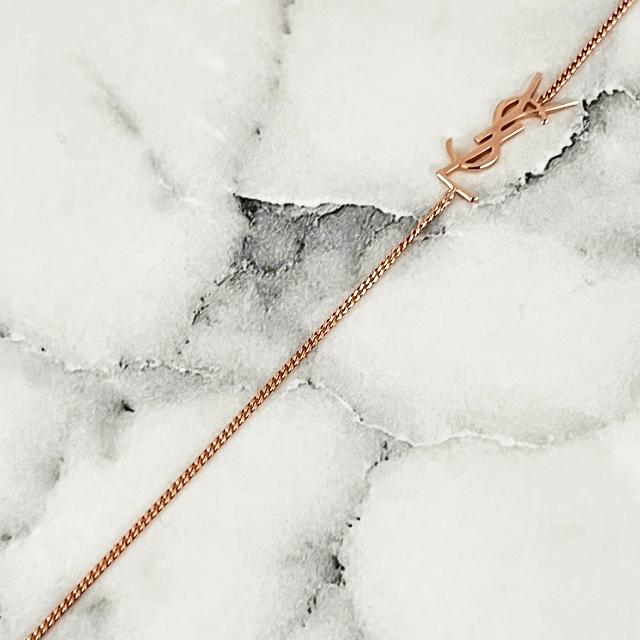 Saint Laurent Opium YSL Logo Charm Bracelet Rose Gold