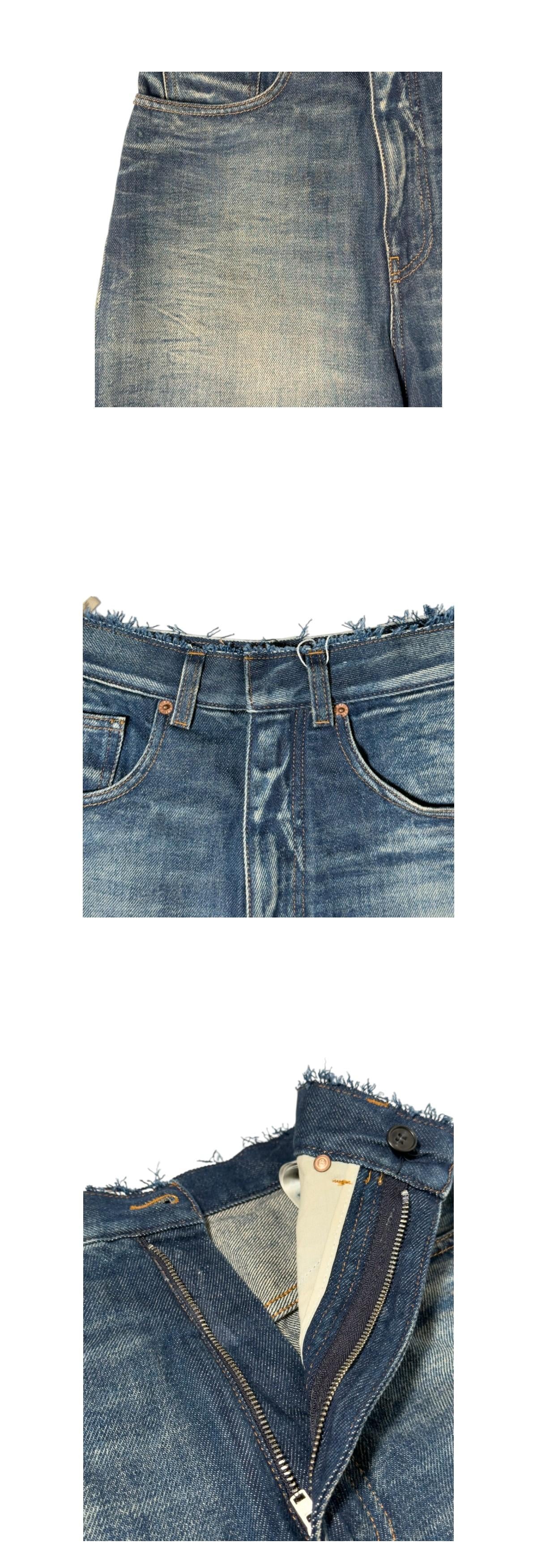 MM6 mid-wash wide-leg denim jeans
