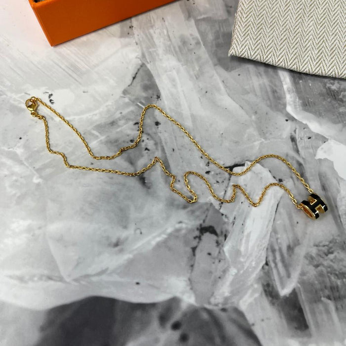 HERMES Mini Pop H Necklace Black Yellow Gold Pendant