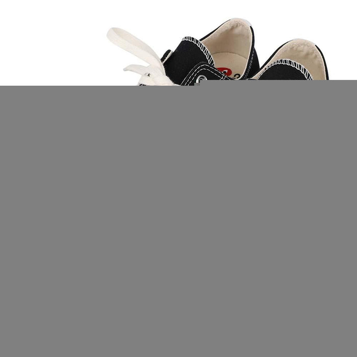 Comme des Garcons Chuck Taylor Low Top Sneakers