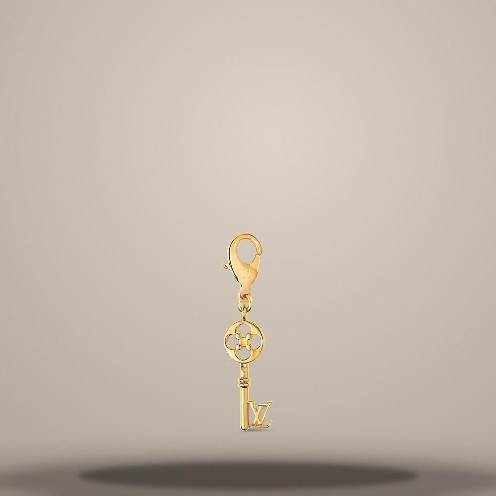 Louis Vuitton Gold-Tone Metal LV Charm Key Ring M04052