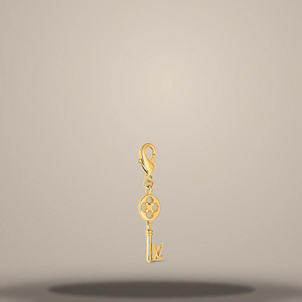 Louis Vuitton Gold-Tone Metal LV Charm Key Ring M04052