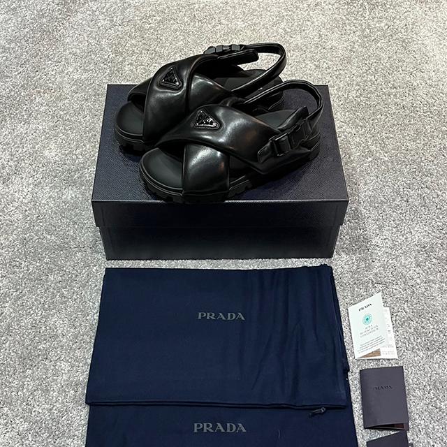 PRADA Triangle Logo Padded Nappa Leather Crisscross Sandals Black