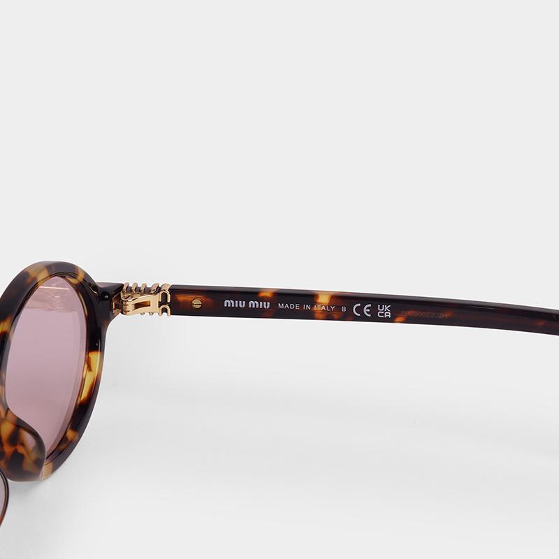 Miu Miu Regard Pink Sunglasses 04ZS 14L4I0 50