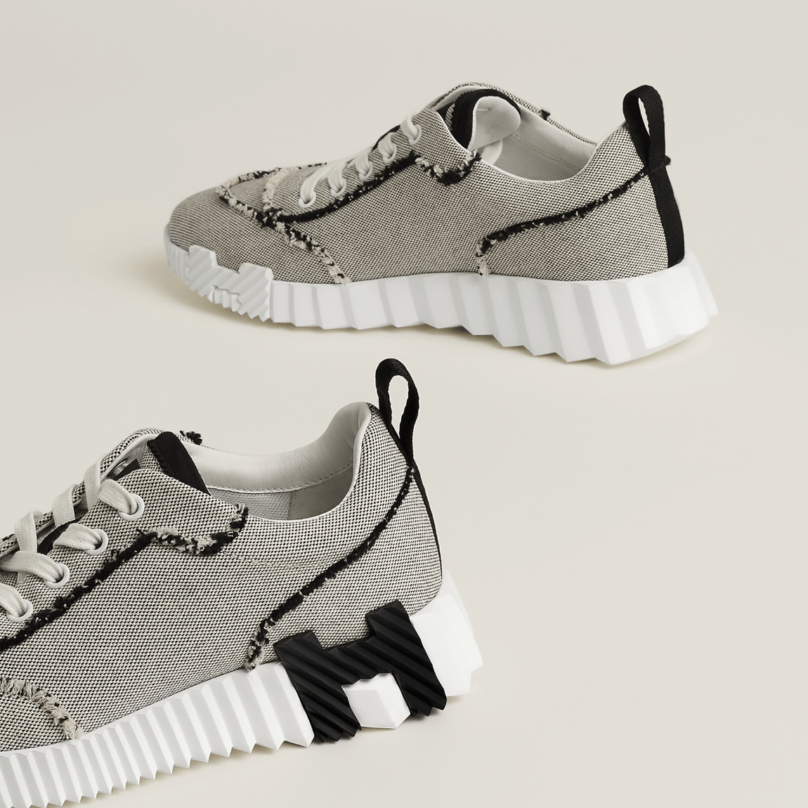 HERMES Noir Bouncing Low Top Sneakers Unisex