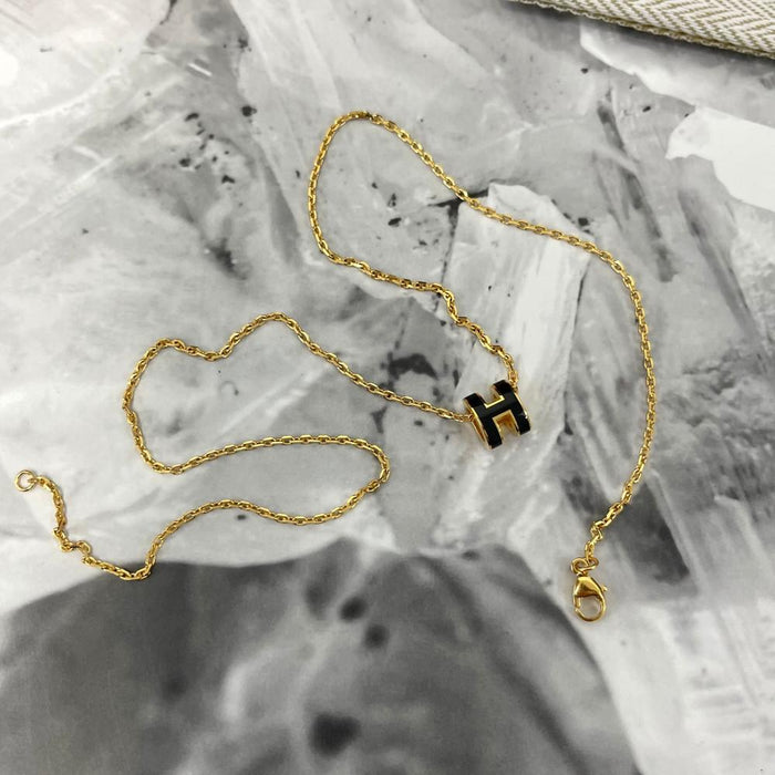 HERMES Mini Pop H Necklace Black Yellow Gold Pendant