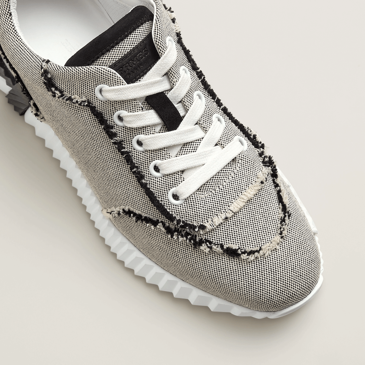 HERMES Noir Bouncing Low Top Sneakers Unisex