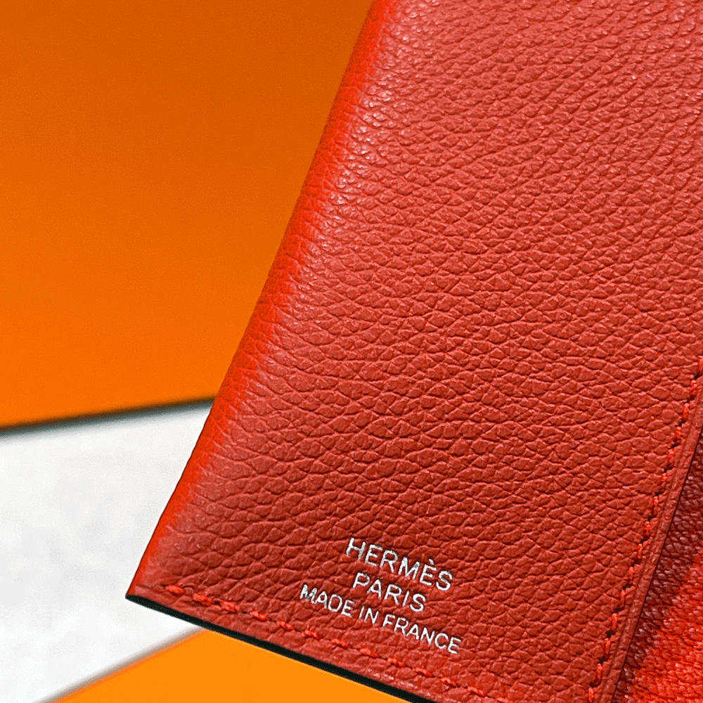 HERMES Coral Red Epsom Calfskin RMS Passport Holder Wallet Unisex