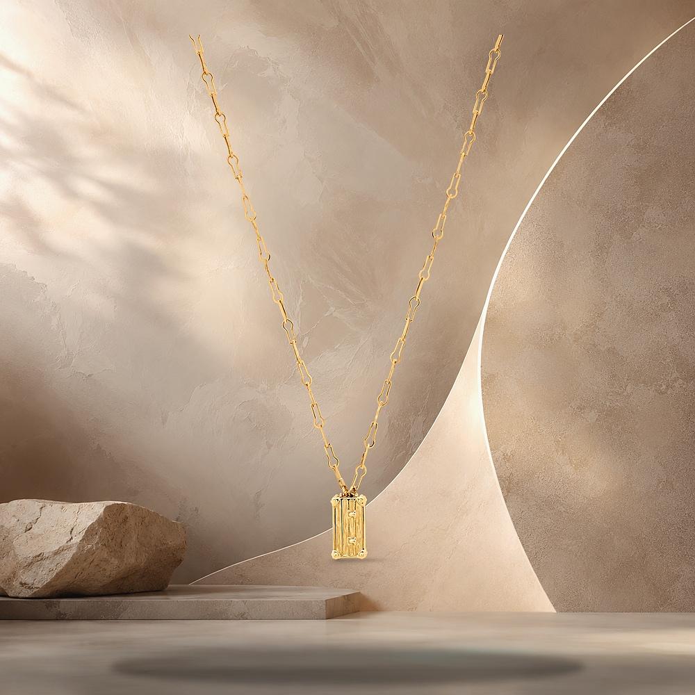 Louis Vuitton Gold-Tone Metal LV Trunk Pendant Necklace M03702