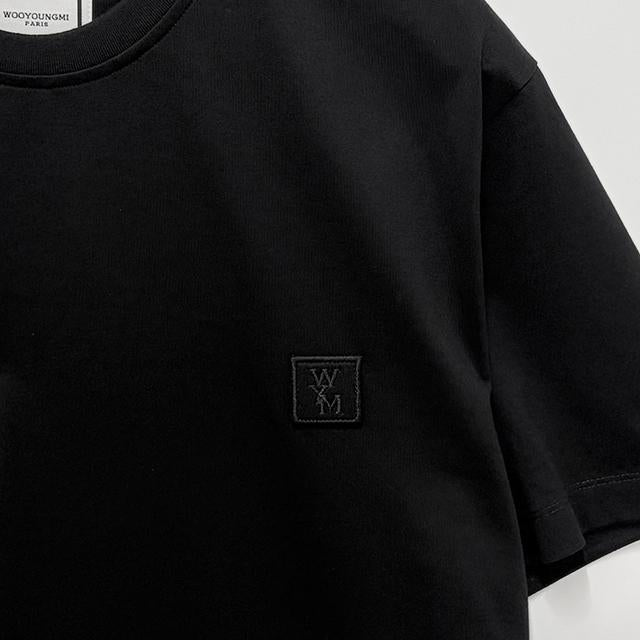 WOOYOUNGMI Black Flower Back Logo Short Sleeve T-Shirt