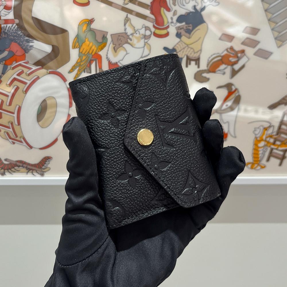 Louis Vuitton Monogram Empreinte Zoe Wallet Black Bifold Unisex