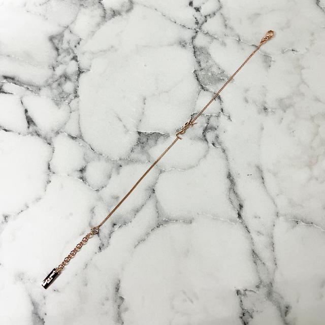 Saint Laurent Opium YSL Logo Charm Bracelet Rose Gold