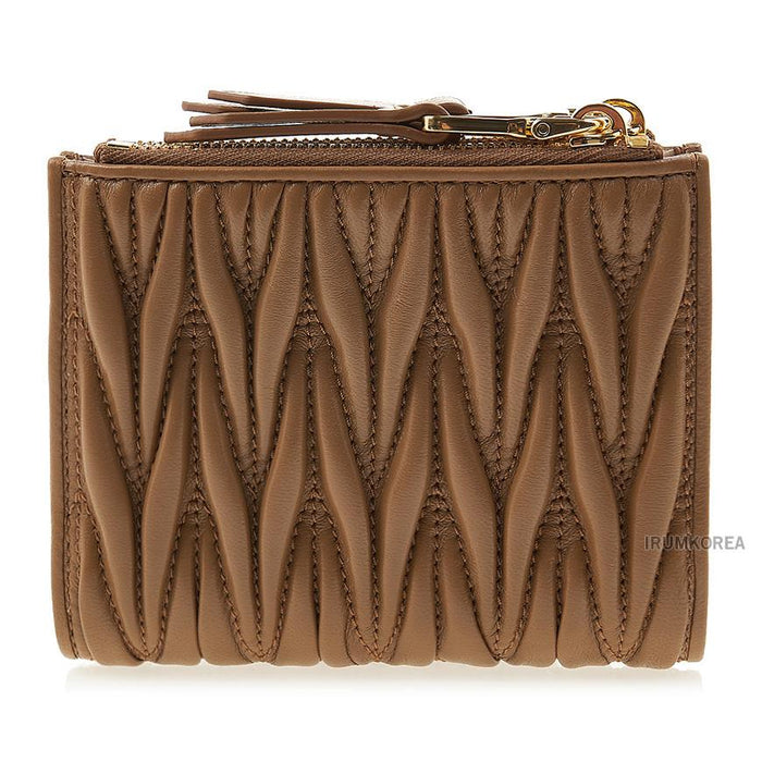 Miu Miu Women’s Small Matelassé Leather Bifold Wallet Navy