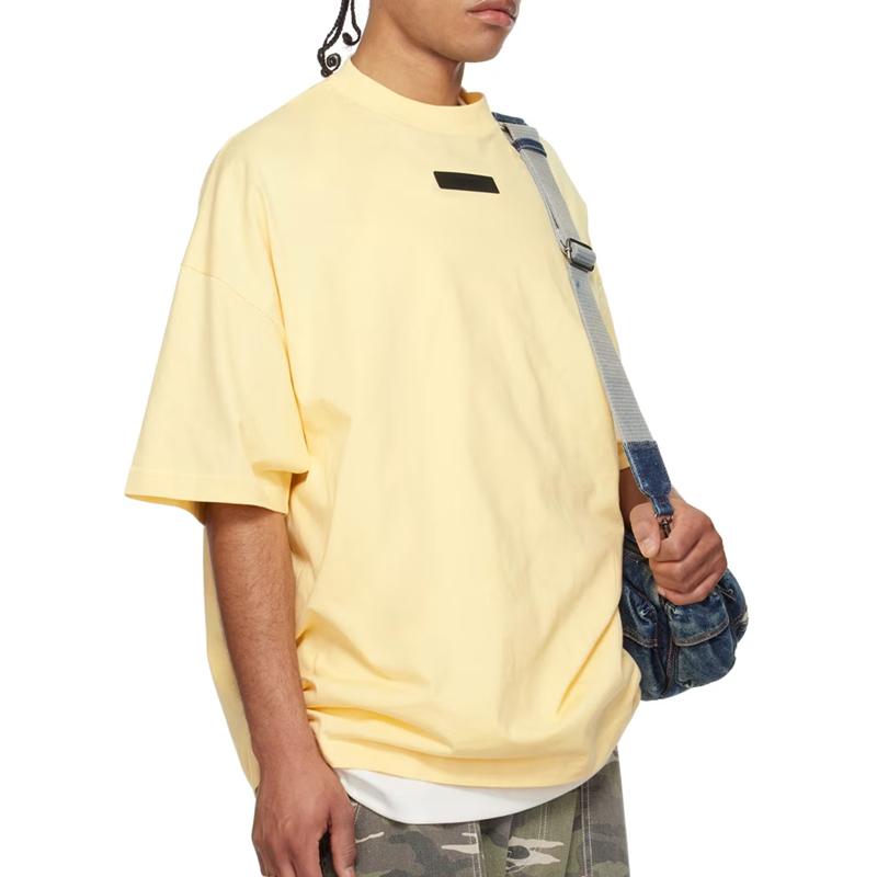 Fear of God Essentials Logo Patch Canary T-Shirt