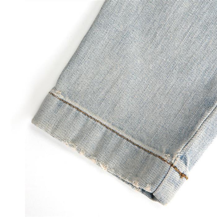 Dolce&Gabbana Light Wash Denim Jeans with Plate Detail