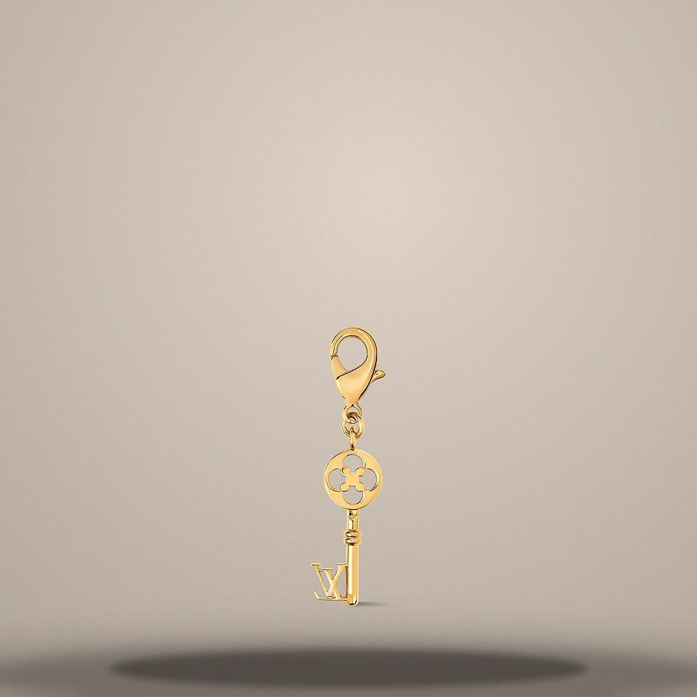 Louis Vuitton Gold-Tone Metal LV Charm Key Ring M04052