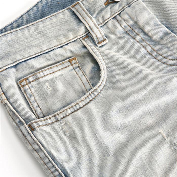 Dolce&Gabbana Light Wash Denim Jeans with Plate Detail