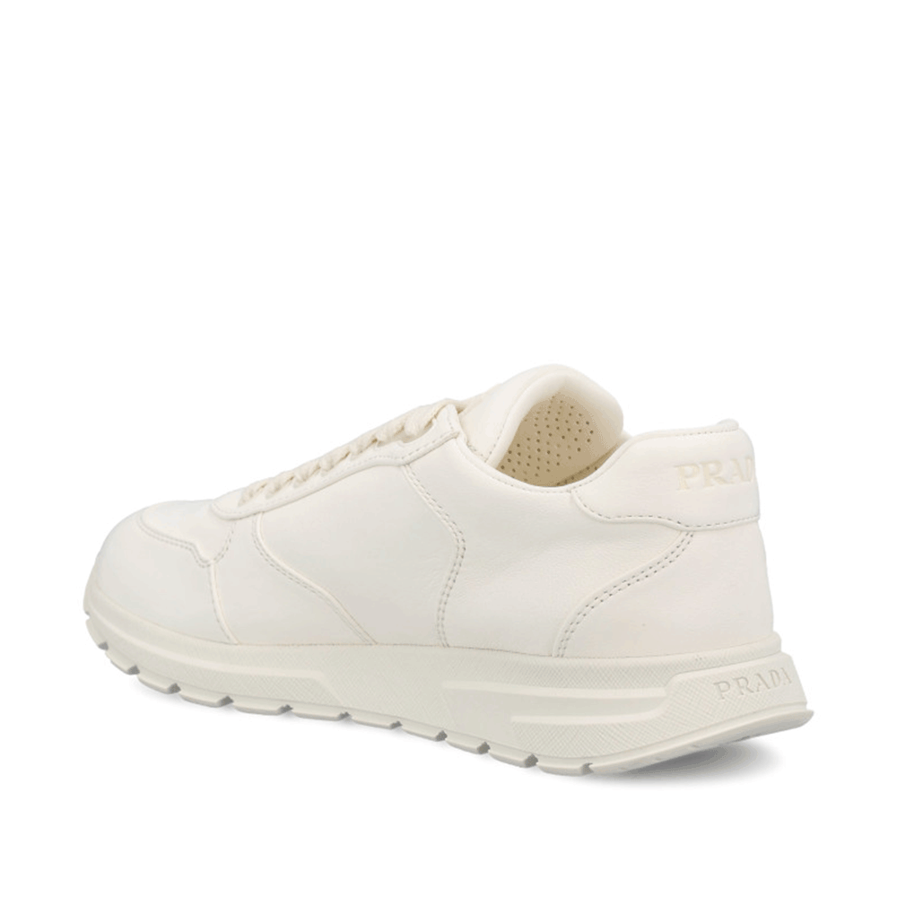PRADA White Leather Low-Top Sneakers with Gold Triangle Logo Women 1E0210